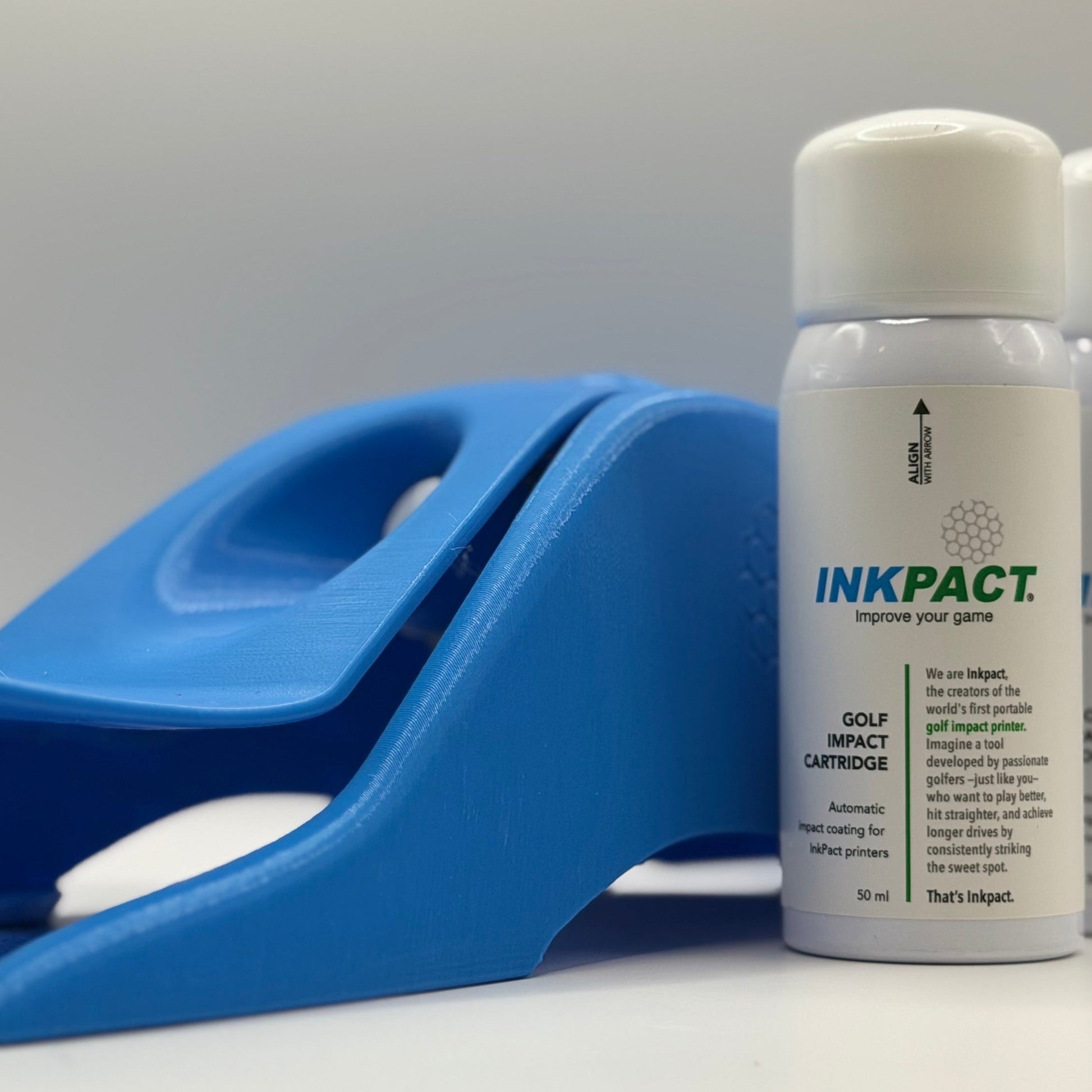 Blue Inkpact golf impact Printer with two INKPACT VT Cartridges on a white background
